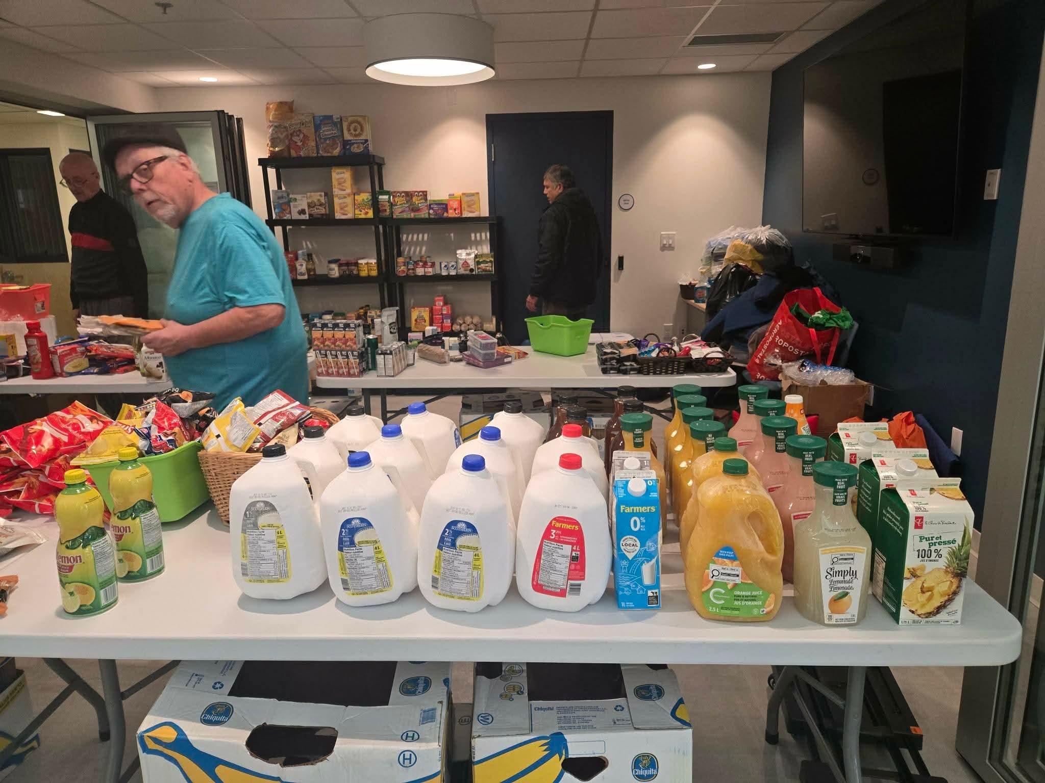 Volunteers at a Humble Harvest free market event